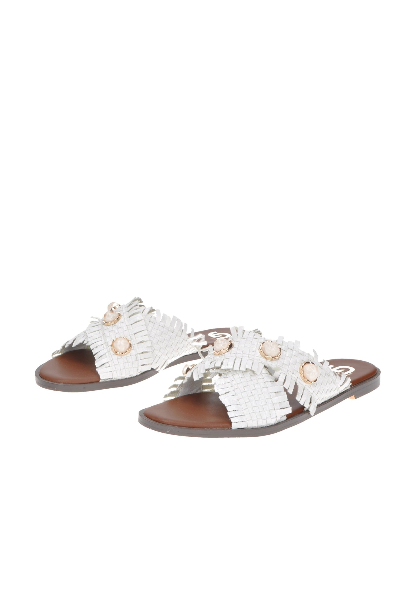 Stylish white sandals with decorative fringes and embellishments on brown sole for a chic summer look.