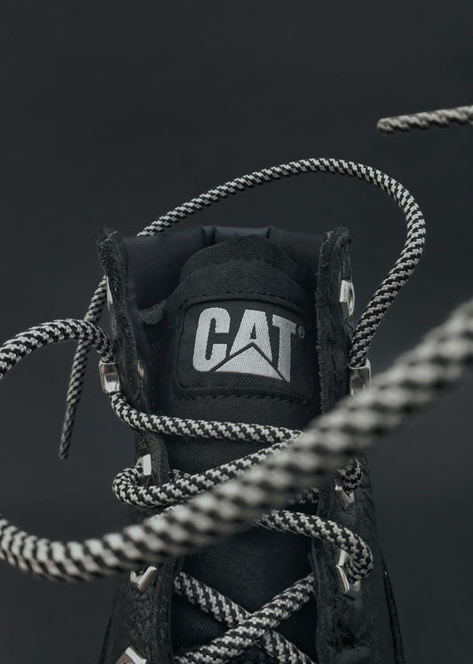 a close up of a shoe with a rope