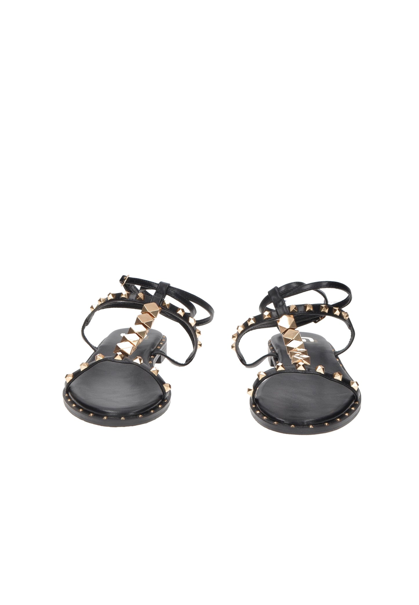 Elegant black sandals with gold studs and ankle straps, perfect for stylish summer outings.