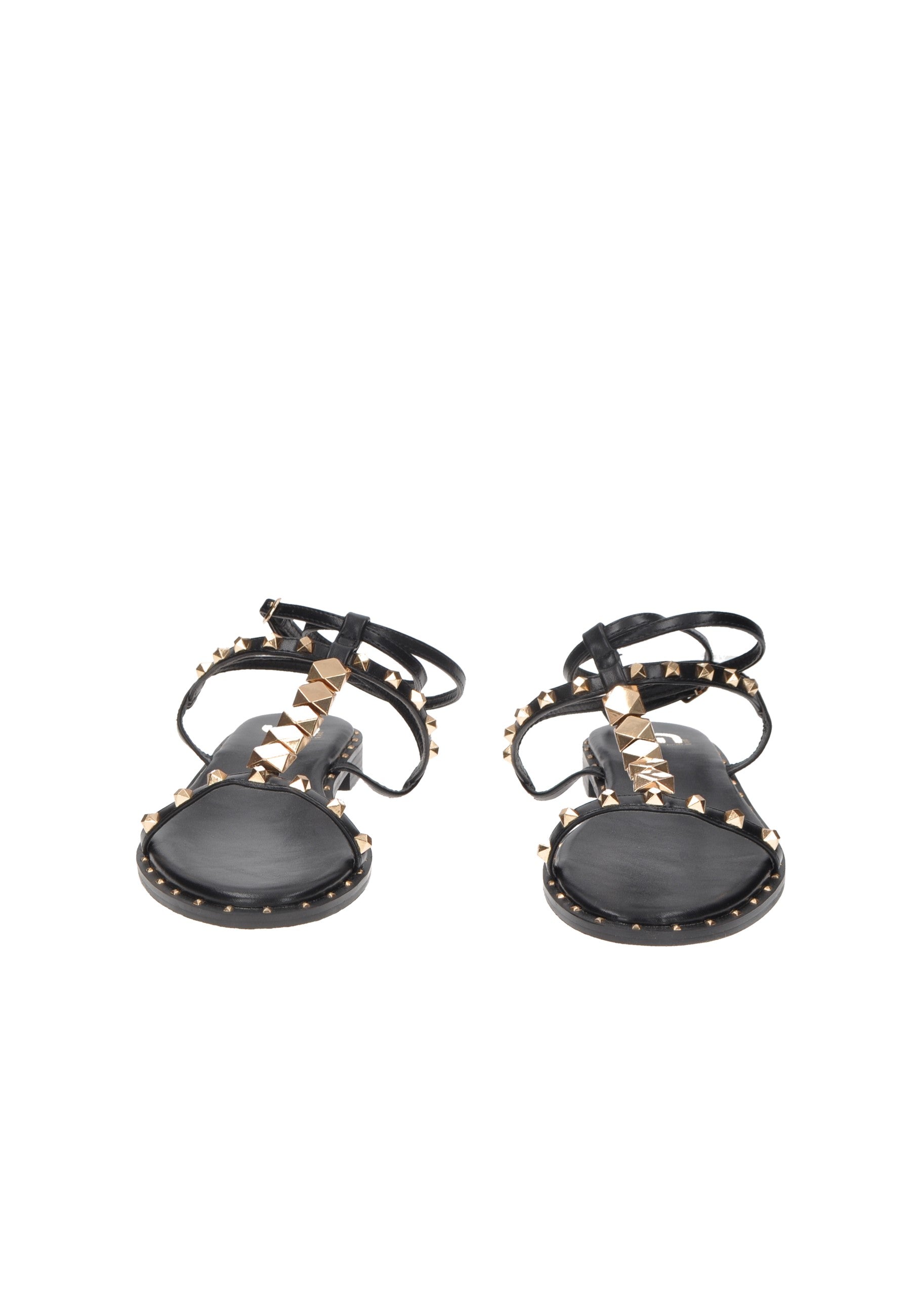 Elegant black sandals with gold studs and ankle straps, perfect for stylish summer outings.
