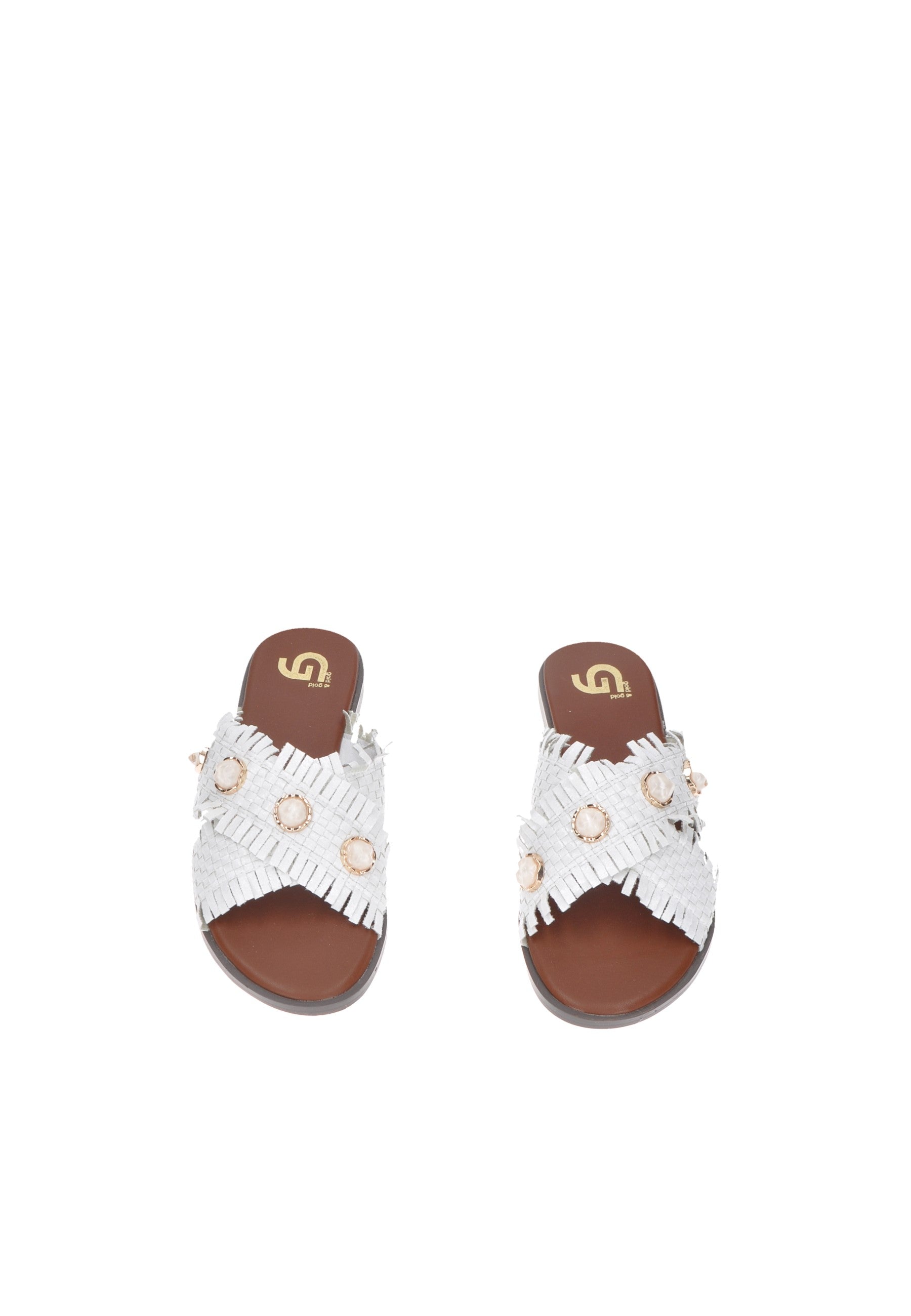 Stylish white slide sandals with decorative shells and comfortable brown footbed.