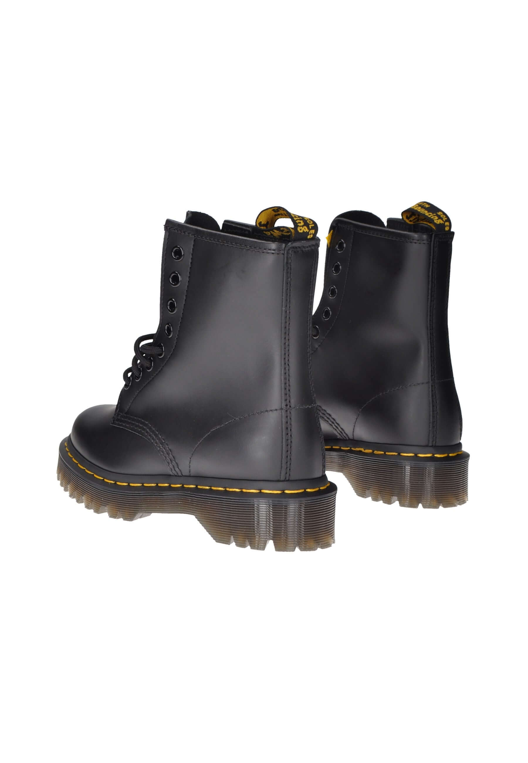 Dr. Martens 1460 Bex black leather boots with lace-up closure and rubber sole, showcasing a rock-style design.