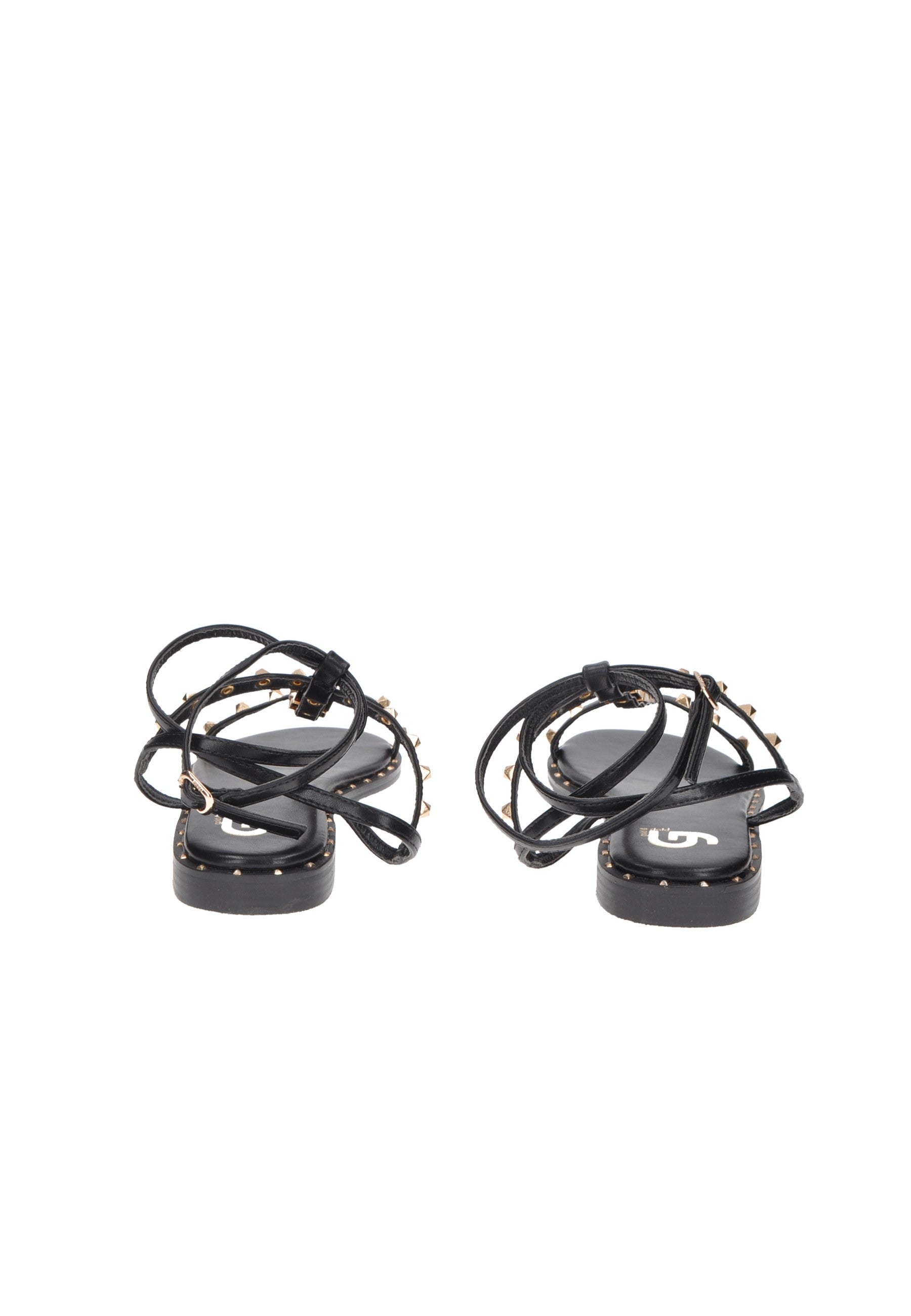 Black strappy sandals with embellished straps and cushioned footbed, stylish and comfortable for casual wear.